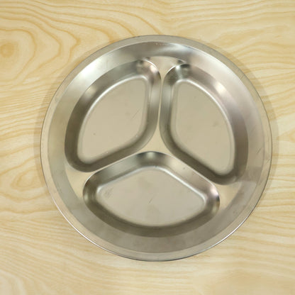 Wukusy stainless steel 3-compartment plate for meals and snacks, 25.5x25.5 cm, showing divided sections and shiny surface.