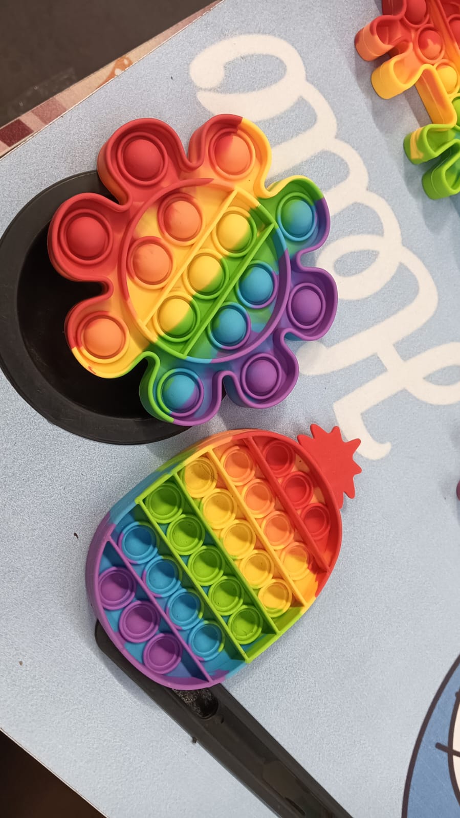Wukusy 4755 Mix Pattern Rainbow Color Push Pop Bubble Fidget Toy, colorful silicone sensory toy with various bubble patterns.