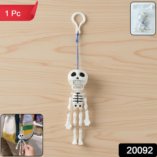 Wukusy hanging skeleton doll keychain featuring a detailed skeleton figure attached to a metal keyring.