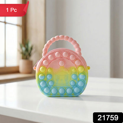 Rainbow round silicone Pop It coin purse by Wukusy with colorful, soft silicone bubbles and compact coin storage.